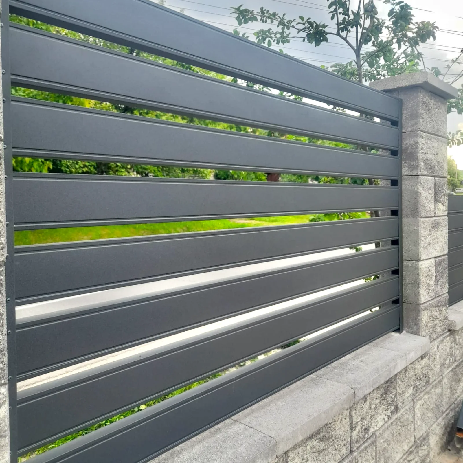 Terra Pro fence on a stone base wall